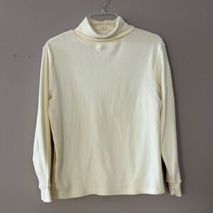 Stephanie Rogers Yellow Turtleneck